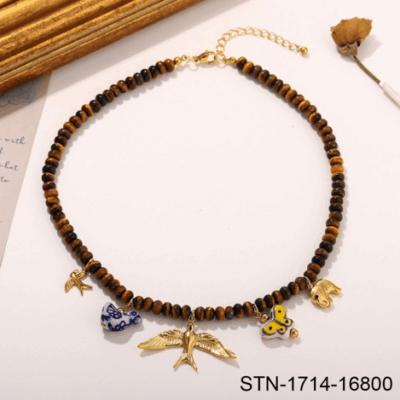 Craftsmanship necklace with medieval elements, ancient swallow